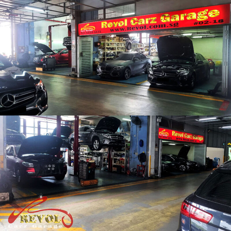 Revol Carz Garage mechanic diagnosing a BMW engine