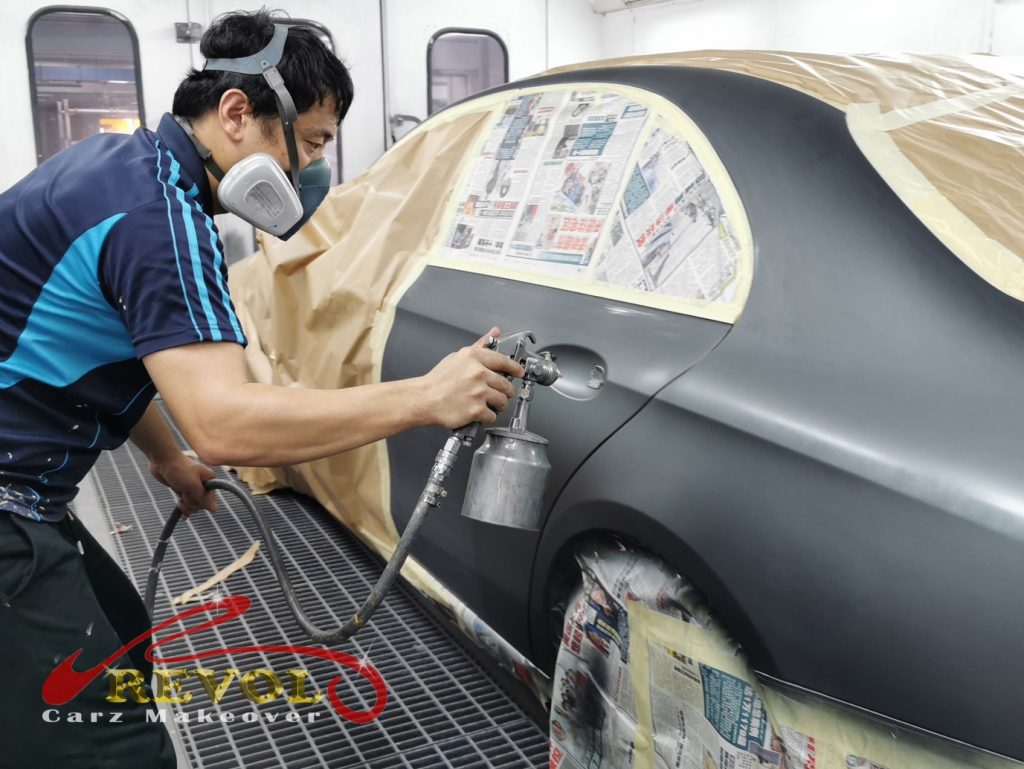 Panel spray painting in dust-free spray booth